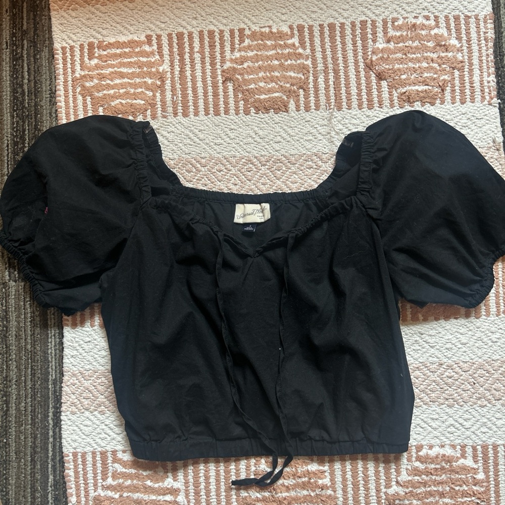 Super cute boutique black ruffle sleeve top